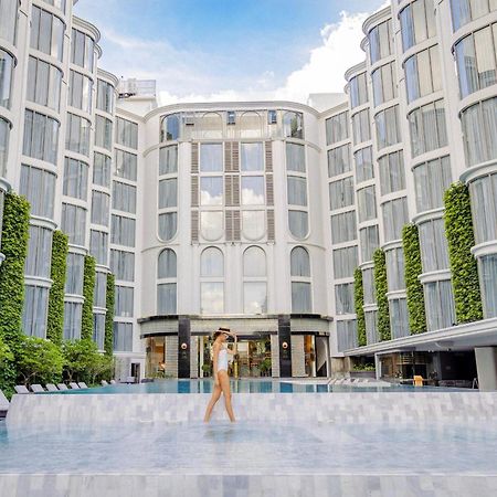 The Salil Hotel Riverside Bangkok Eksteriør bilde The hotel's courtyard